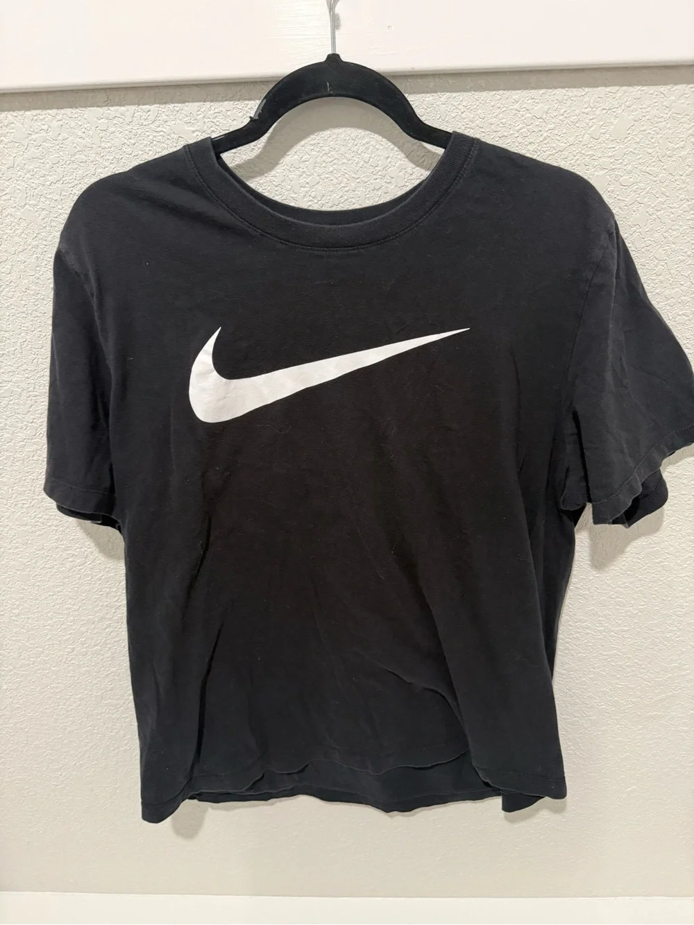 Nike Black T-Shirt with White Swoosh Logo